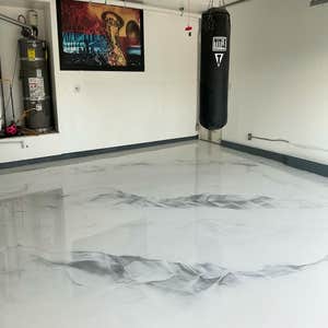 Photos by V2 Construction & Remodel #4 Garage transformed with an all new Resin Floor! Really is just a fascinating look.