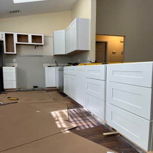 Photos by Tropical Building & Remodeling Inc #1 Completely removed old kitchen and end pony wall. Cut down pony wall to cabinet height and...
