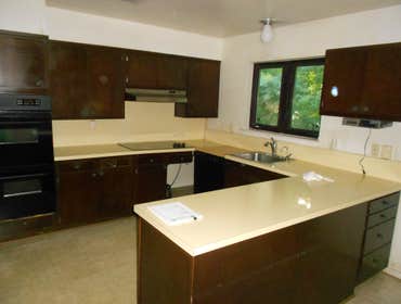 Kitchen start to finish total renovation with new large window opening up 2 walls for open floor plan of house