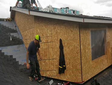Altura St Pop Top We removed the roof and built a second story on their house.