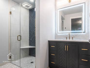 High End Shower Remodeling in South Hill Complete high-end bathroom and custom shower remodel including demolition of existing finishes and fixtures. I