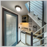 Asheville Tiny Home 320 SF ADU. 1 bedroom, 1 bath, kitchenet, laundry, and a covered poach makes a charming living arrangement in east Asheville.