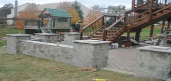 Paver Patio and Walkway This is a a combination of some of our work. Landscaping box and Veneer retaining wall, walkway and flagstone patio.