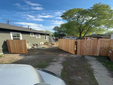 Cedar fence with 10ft opening gate.