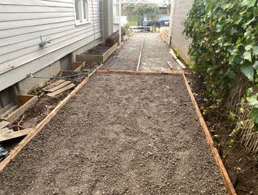 Photos by NW Regal Construction LLC #1 Driveway, retaining wall, and city sidwalk