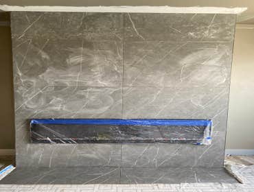 Photos by Rain City Design #2 Fireplace replacement and reconstruction large tile 32x64