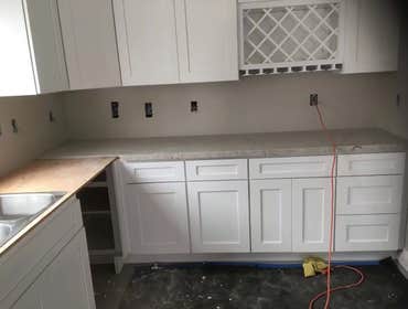 Photos by Pan Shi Construction Inc #1 Converted an existing garage into a fully functional Accessory Dwelling Unit (ADU), The project included framing 