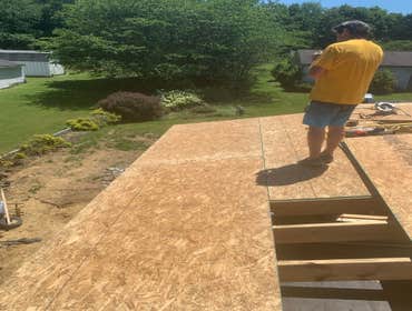 Photos by C.S Remodeling & Construction #1 Dust protection and entry to home protection temporary wall built to prevent anyone or anything from getting
