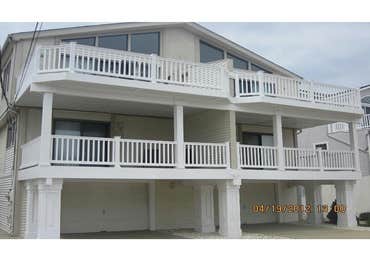 Photos by Saviors Custom Carpentry, Inc #1 Composite steps, vinyl railings & 1x4 azek