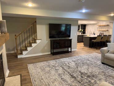 Sheffield Ave, POWELL Basement ReFinish Full basement re-finish following a flood and water remediation work. Includes new Pella windows and doors, cus