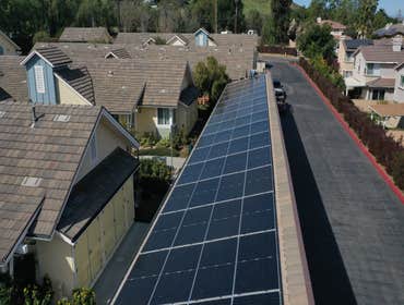 Photos by Trmj Roofing Inc Solar Panal Inserts on comp shingle with tile picture frame