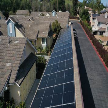 Photos by Trmj Roofing Inc Solar Panal Inserts on comp shingle with tile picture frame