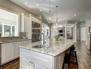 GULICK | CUSTOM Home in McLean The impressive stone and HardiePlank® elevation on our Winthrop really stood out on this corner lot of approximately one
