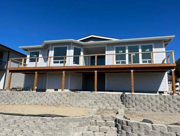 Photos by Sta Dri Continuous Gutters #1 New custom home with new custom color continuous gutters.