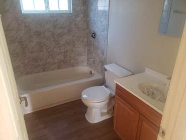 Photos by Mundwyler Enterprise #2 Flatten walls then texture and paint. Replace the entire bathroom. Add a stove vent and new bace mold