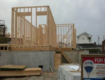 Photos by Teagan Homes #1 New construction of two townhomes sold to individuals for about $450000 each unit. Profit margin was over $250,000 in less th