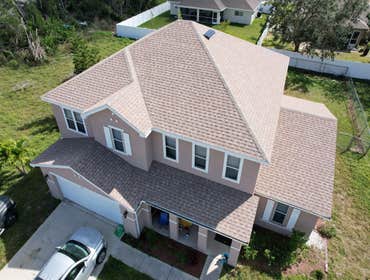 Photos by WOODSTONE ROOFING