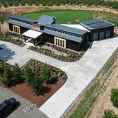 Photos by Aspire Homes Inc #3 Custom home with roof insulation, exterior insulation, solar, geothermal and pool.