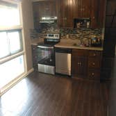 tile floor, mosaic backsplash, paint and trim