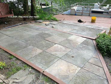 David L. Sisk Landscape & Home Services Project Exterior projects: stone patio near a waterway, new stone walkway and retaining wall with new wood fenc
