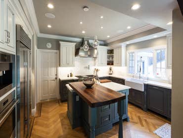Morgan Hill Kitchen & Bar Custom cabinets and flooring along with designer fixtures and sophisticated accents create a classy, yet cozy home in Morgan 
