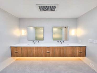 Photos by Axmis Construction #1 This project focuses on converting a garage into an Accessory Dwelling Unit (ADU) nestled in the Hollywood Hills area. 