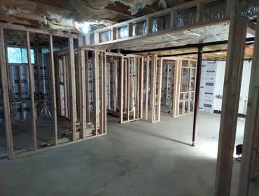 Photos by PorterRobert LLC #22 Basement finishing with office, bedroom, and bathroom