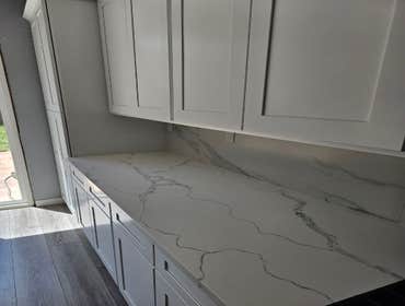 Fine Design Remodeling resume painting, frame, tile, cabinet install, shower, more.