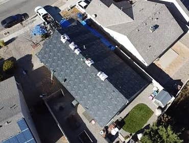 6348 Avenida Madrid NW Re-Roof + New garage door