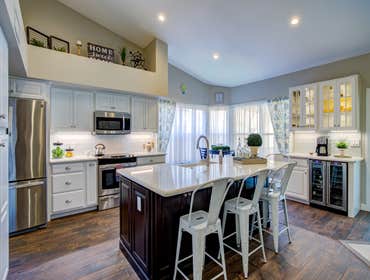 Korstadt Kitchen Remodel/New tile throughout/New Baseboard & Doors Removed all baseboard and flooring throughout, removed a high top bar at island and 
