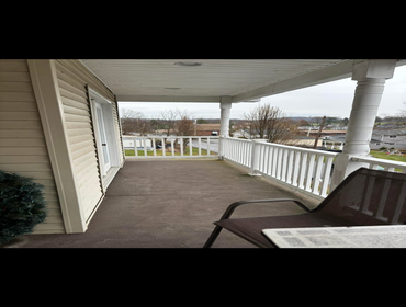 Addition Enclosed deck to convert into a bedroom.