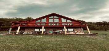 Photos by Happy Hammers Construction #2 Original beams were rotten and replaced with pressure treated 6x6's. Deck was raised and leveled.
