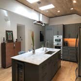 Travis Country Remodel This single family dwelling was originally a track home in one of the premier developments of Austin, TX. Travis Country was the