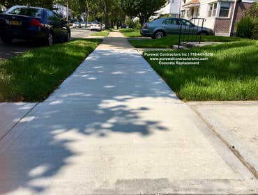 Bayside Sidewalk & Driveway Replacement This gorgeous two-story home is located in prime Queens NY and features new installed concrete driveway With a 