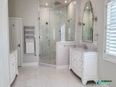 Luxurious Master Bath Remodel We redesigned this master bathroom, relocating the shower to the corner, allowing for a bigger shower. This powerful and 