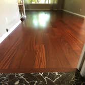 African Mahogany Sapele 1/2" x 5" African Mahogany Sapele Engineered Hardwood. Installed Flush to tile flooring.