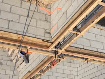 Mount Washinton Hillside land development including caissons/piles, grade beams, CMU block walls, retaining walls. All known as foundation and structur