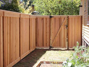 Fences Fences constructed with wood, vinyl, and chain-link or ornamental metal
