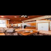 Photos by New Earth LLC #1 Restoration of a 1890's row house. Kitchen is brazilian lacewood and mahogany and the open space concept keeps the exposed b