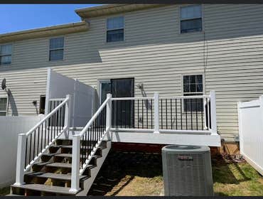 Photos by Pristine Construction #29 The customer had an old wooden deck and we replaced it with a new composite deck with a privacy fence