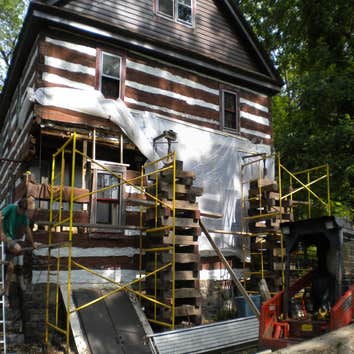 Log House Restoration We started restoration on this antique log house. We jacked up the top half of this log house in order to replace rotted logs. A