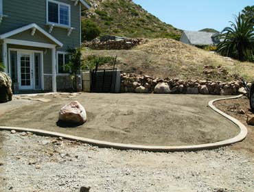 Irrigation Installation, New Sod & Trees Installed new irrigation system, sod and palm trees to this beautiful hillside home.