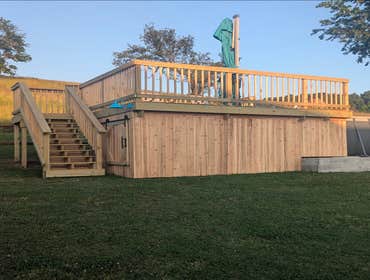 Photos by Fjm Remodeling #1 Above pool 16x16 deck