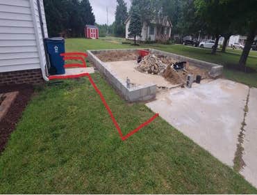 Before and after Garage and sidewalk done in fuquay varina
