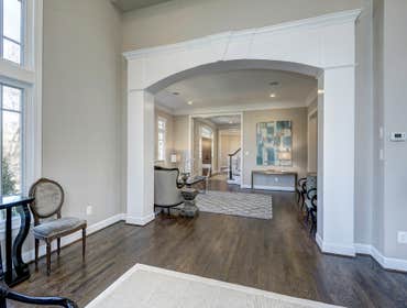 GULICK | CUSTOM Home in McLean The impressive stone and HardiePlank® elevation on our Winthrop really stood out on this corner lot of approximately one