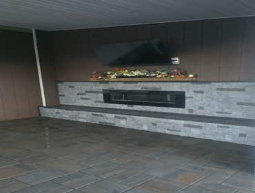 Photos by Rojas Landscaping & Handyman Services LLC #1 Preasure Threated Wood Horizontal Fence Installation
Exterior Fire Place
Paavers Patio/walkway