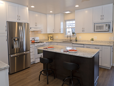 Always Sunny This custom kitchen is warm and inviting. The paint color is a soft hue of yellow making the space feel perpetually cheery and sunlit. T