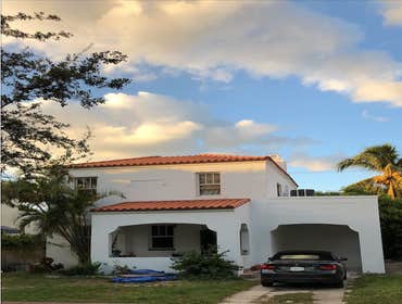 Photos by G6 Investments Home Addition Full-scale interior remodel and second-story addition of this Miami Beach Mediterranean home was designed and bu