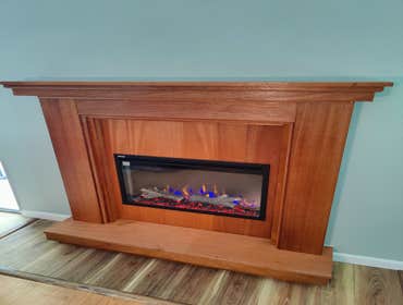 Fireplace Renovation We replaced a wood burning fireplace with an electric LED display heating unit.
We started by removing the old fireplace system 