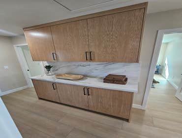 Photoss by Kyvos Construction Inc #32 full kitchen remodel custom cabinets. flooring. drywall. Custom countertop and backsplash, lights. paint. install